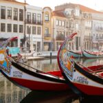 Gondolas In A Canal In Aveiro, Portugal