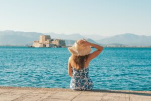 Female tourist posing in front of Nafplio